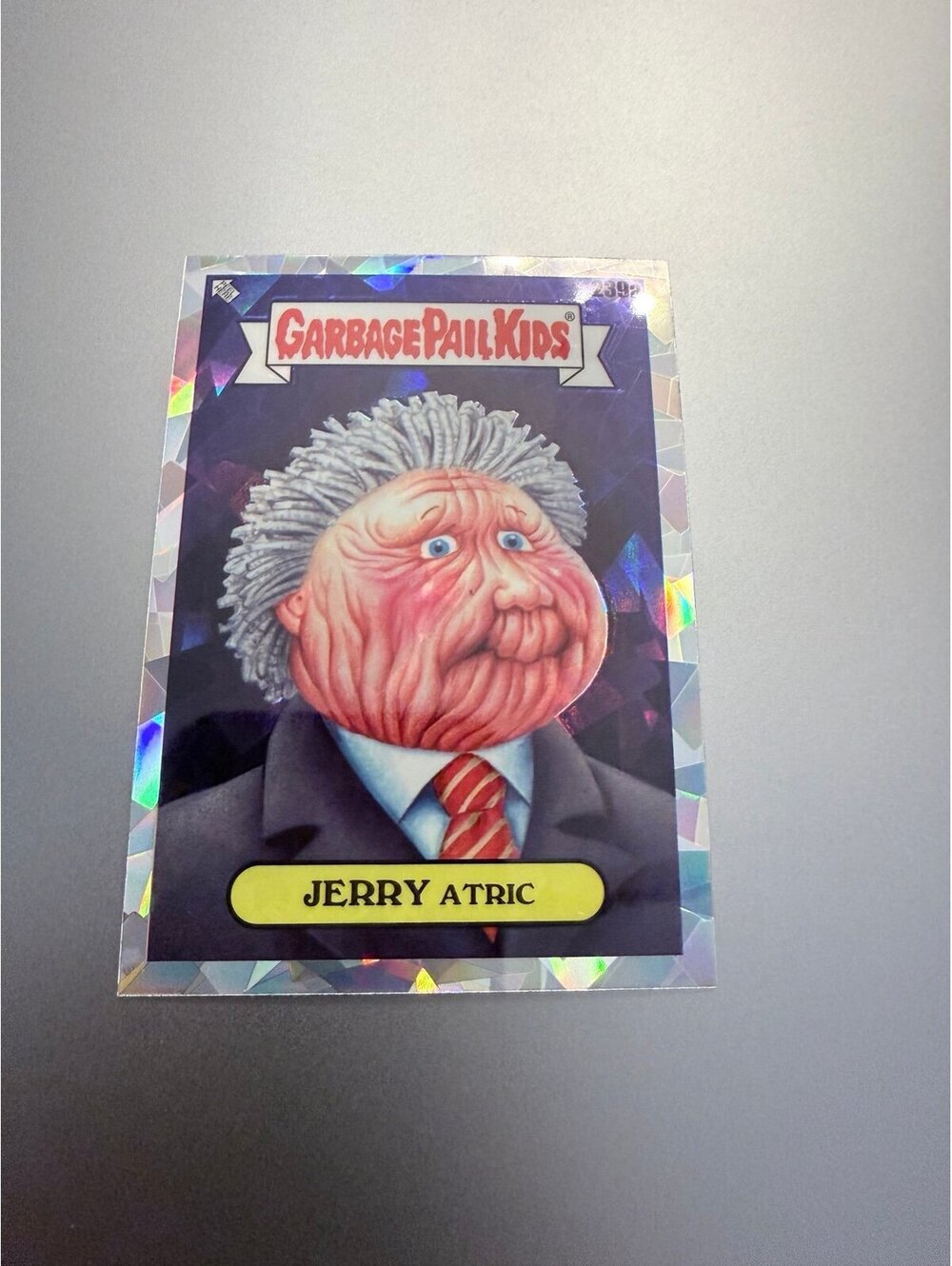 2023 Topps Garbage Pail Kids Jerry Atric #39a Atomic Refractor Trading Card